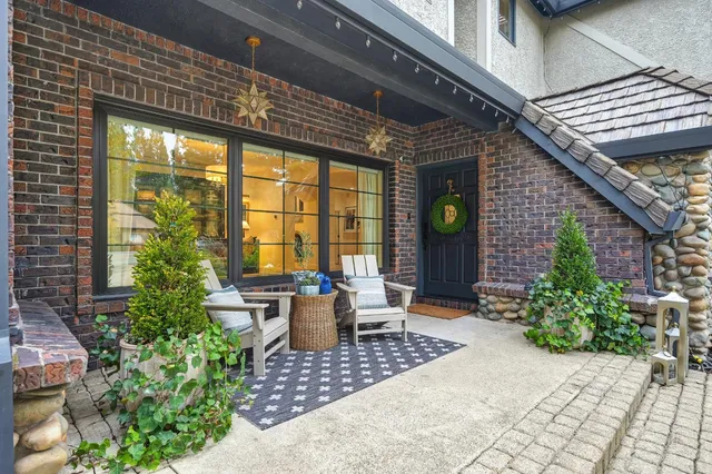 a view of staircase with wooden floor and a rug