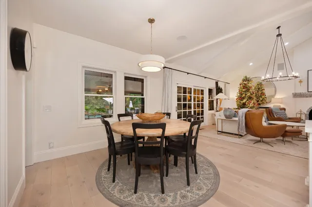 a bathroom with a shower and a mirror