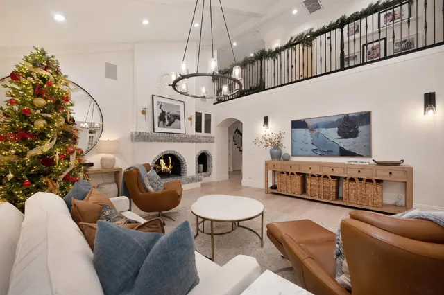 a spacious bedroom with a bed and a table