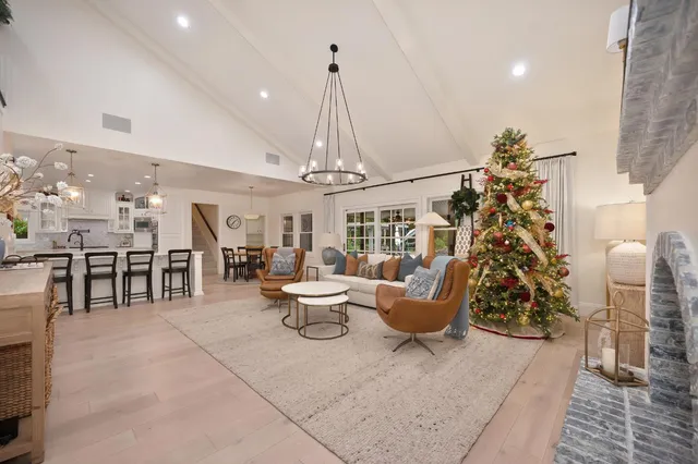 a spacious bathroom with a shower sink and mirror