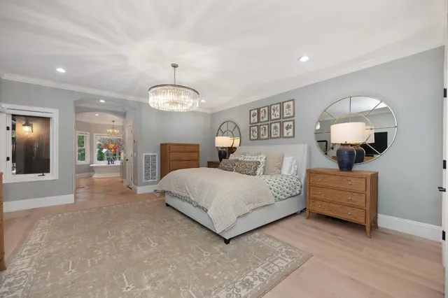a bathroom with a tub and a shower