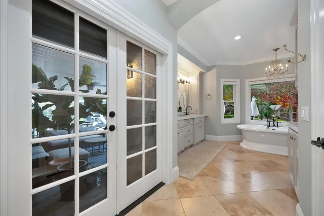 a view of a dining room with furniture window and outside view