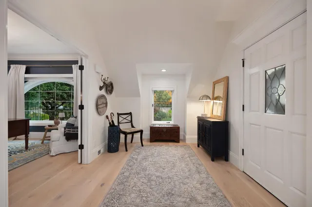 a view of a swimming pool with an outdoor space and seating area