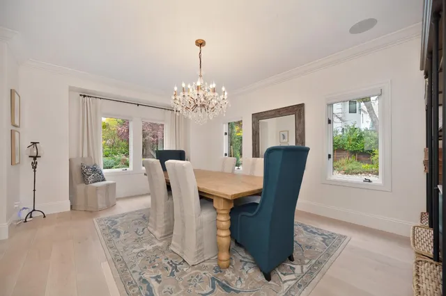 a stove top oven sitting inside of a kitchen