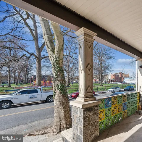 a front view of a building with street view