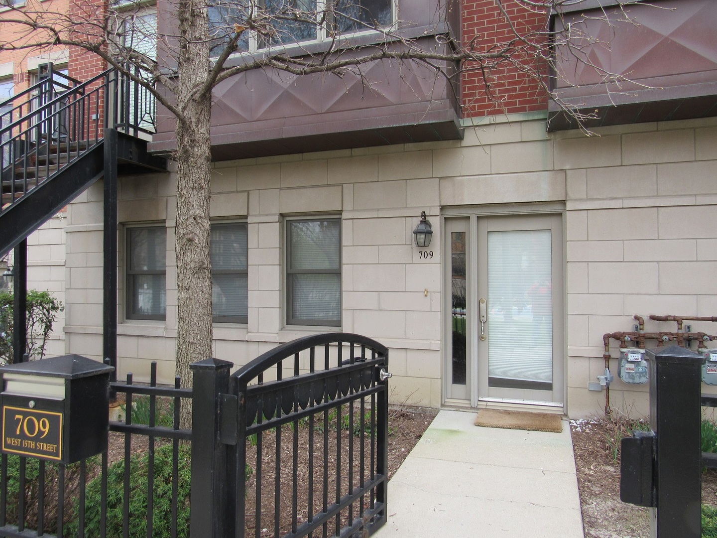 a front view of a house with a glass door