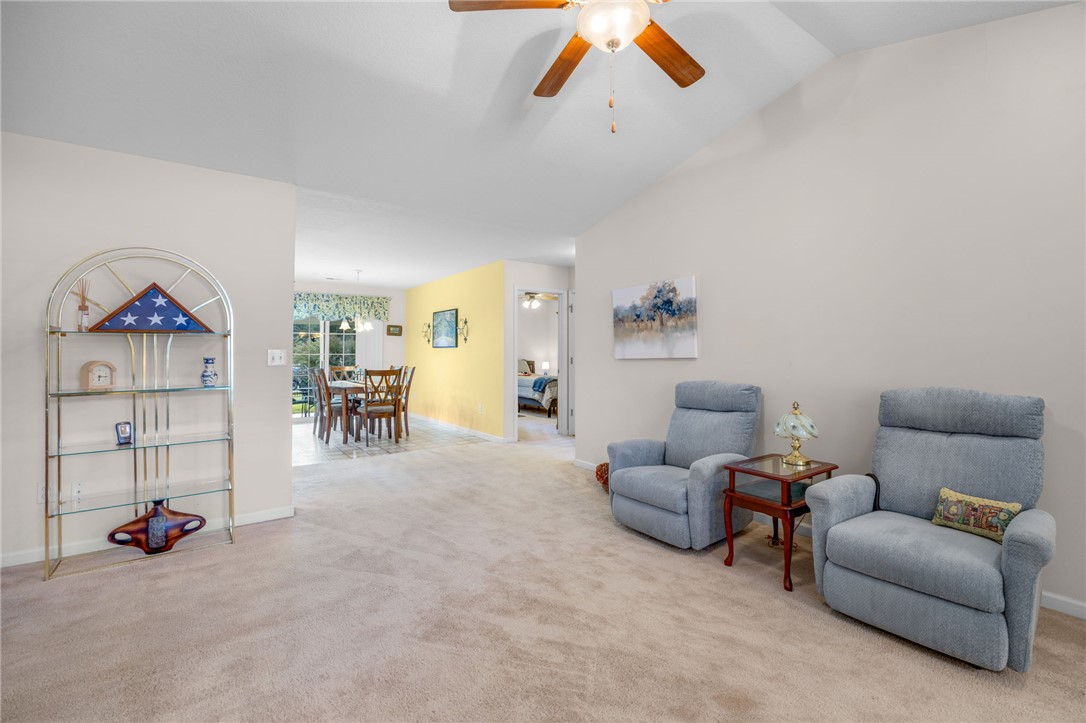 125 Patagonia Road Anderson, SC 29625 - Photo 34 of 36 An open floor plan connects the vaulted living area to the adjacent dining space.