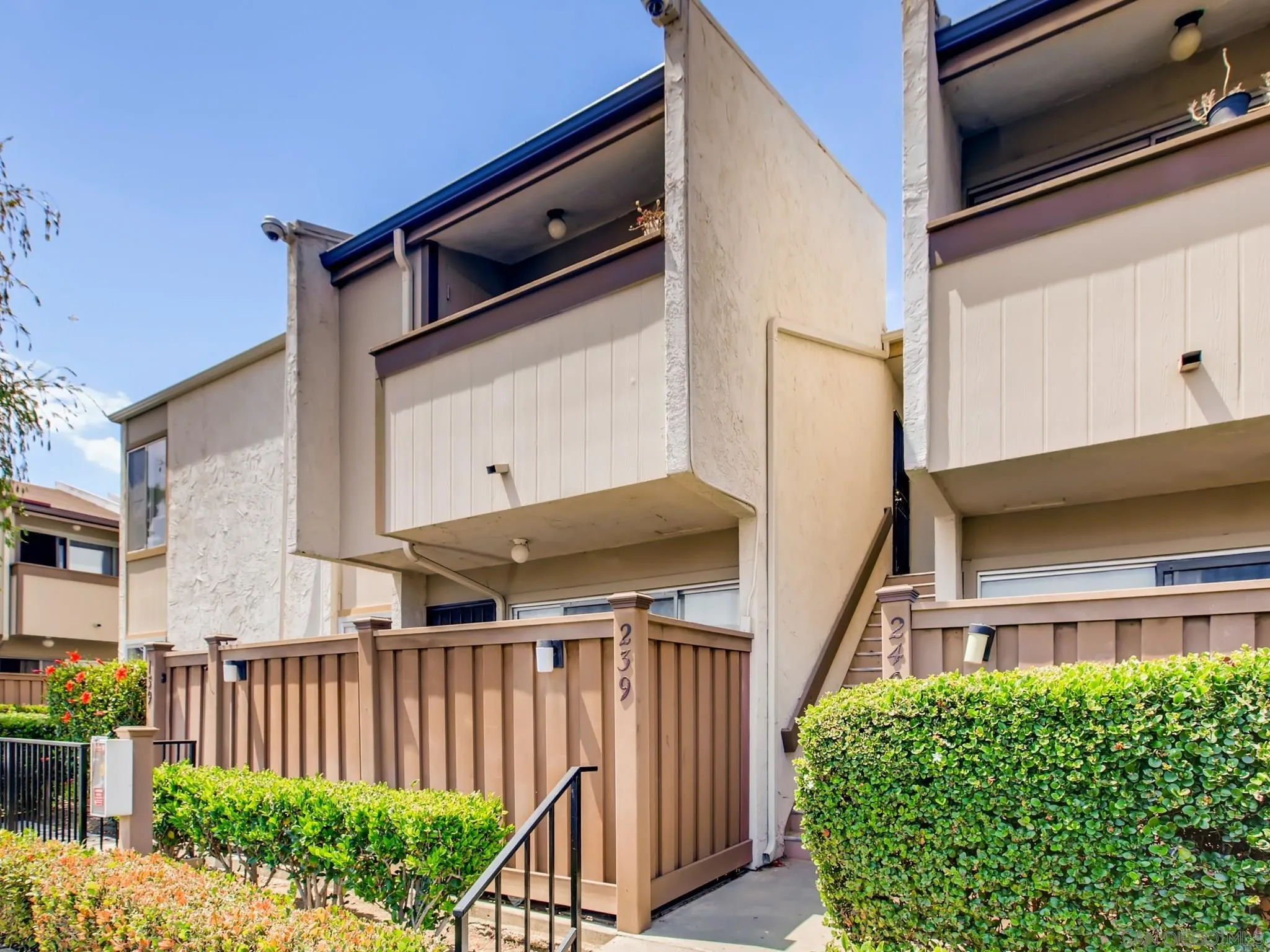 a view of building with glass windows