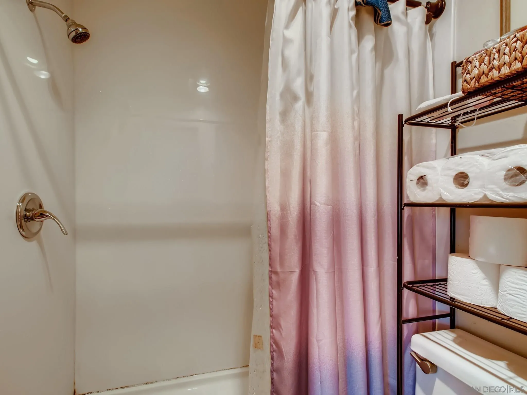 3550 Ruffin Road, Unit 239 San Diego, CA 92123 - Photo 18 of 27 a view of a room with racks on the wall