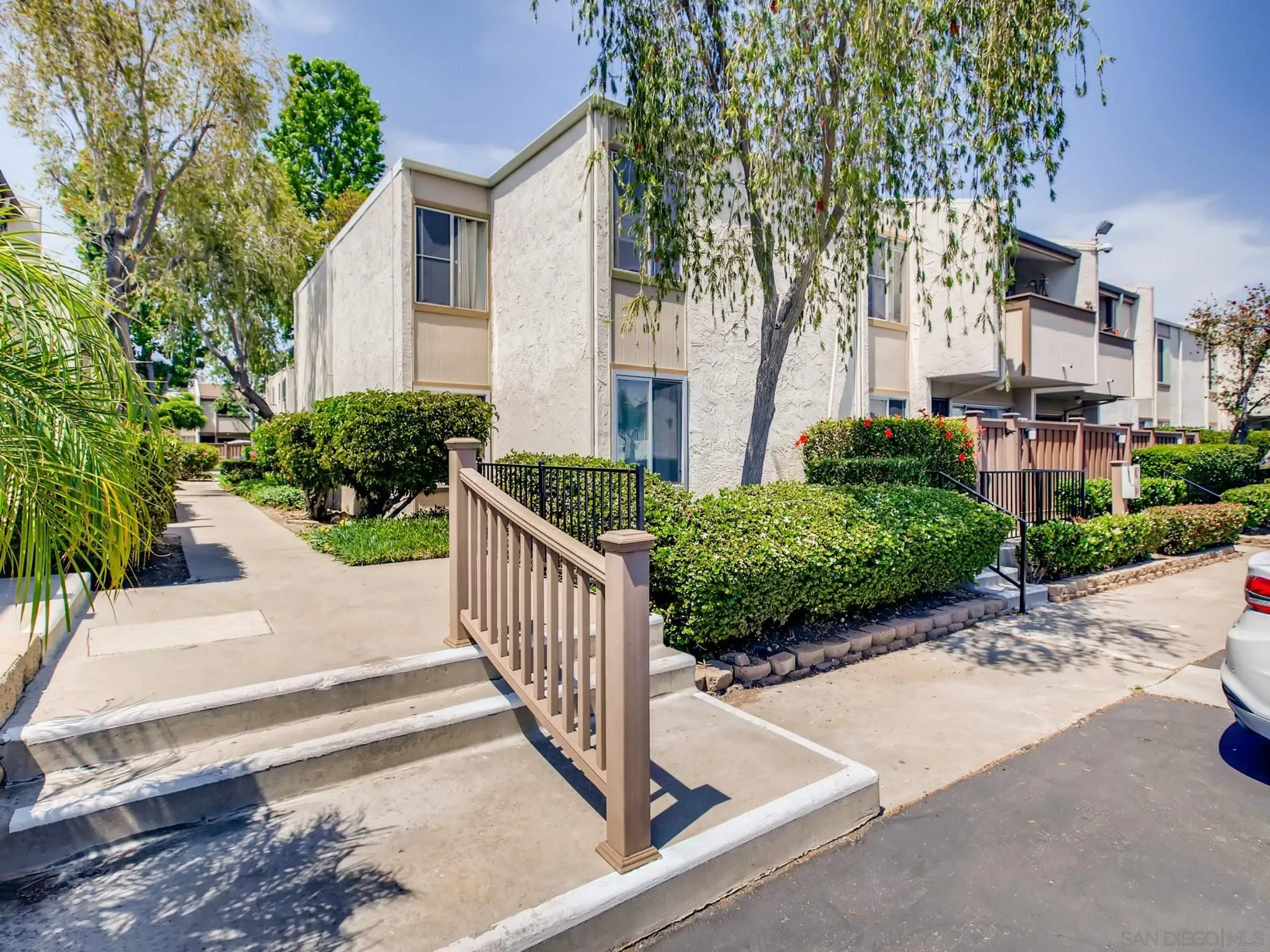 3550 Ruffin Road, Unit 239 San Diego, CA 92123 - Photo 3 of 27 a view of a garden with pathway
