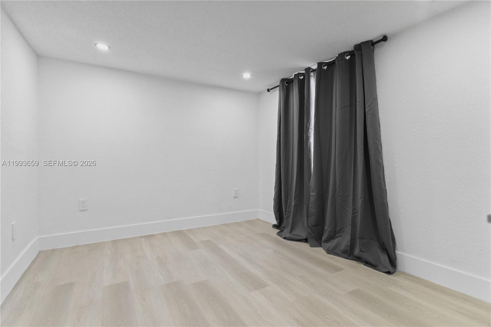 171 West 13th Street Hialeah, FL 33010 - Photo 51 of 84 a view of a room with clothes and shoes