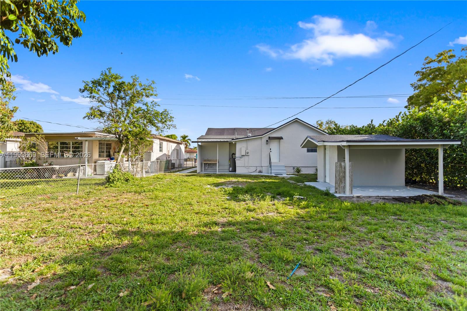 171 West 13th Street Hialeah, FL 33010 - Photo 54 of 84 a front view of a house with garden