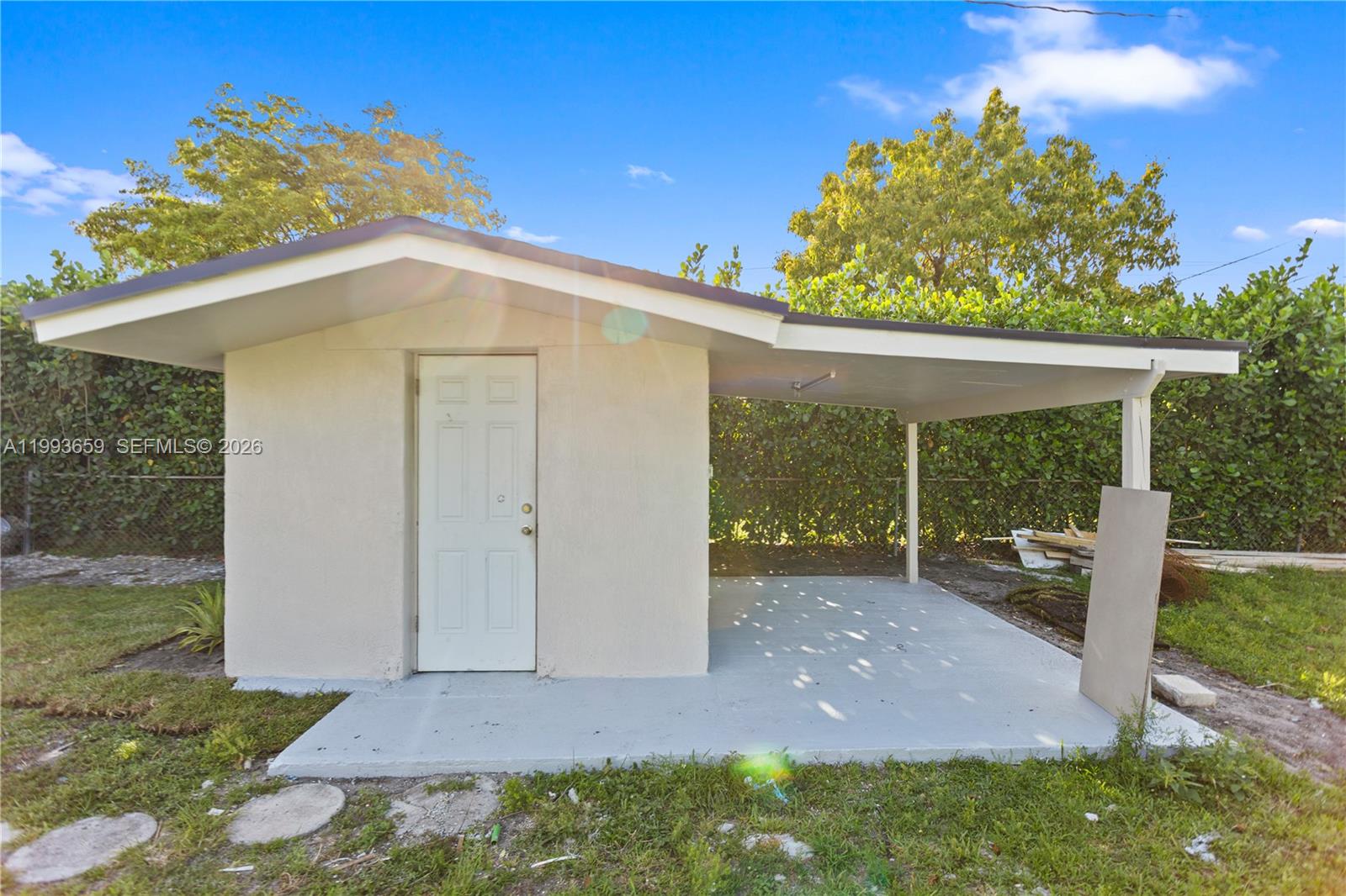 171 West 13th Street Hialeah, FL 33010 - Photo 56 of 84 a front view of a house with a yard
