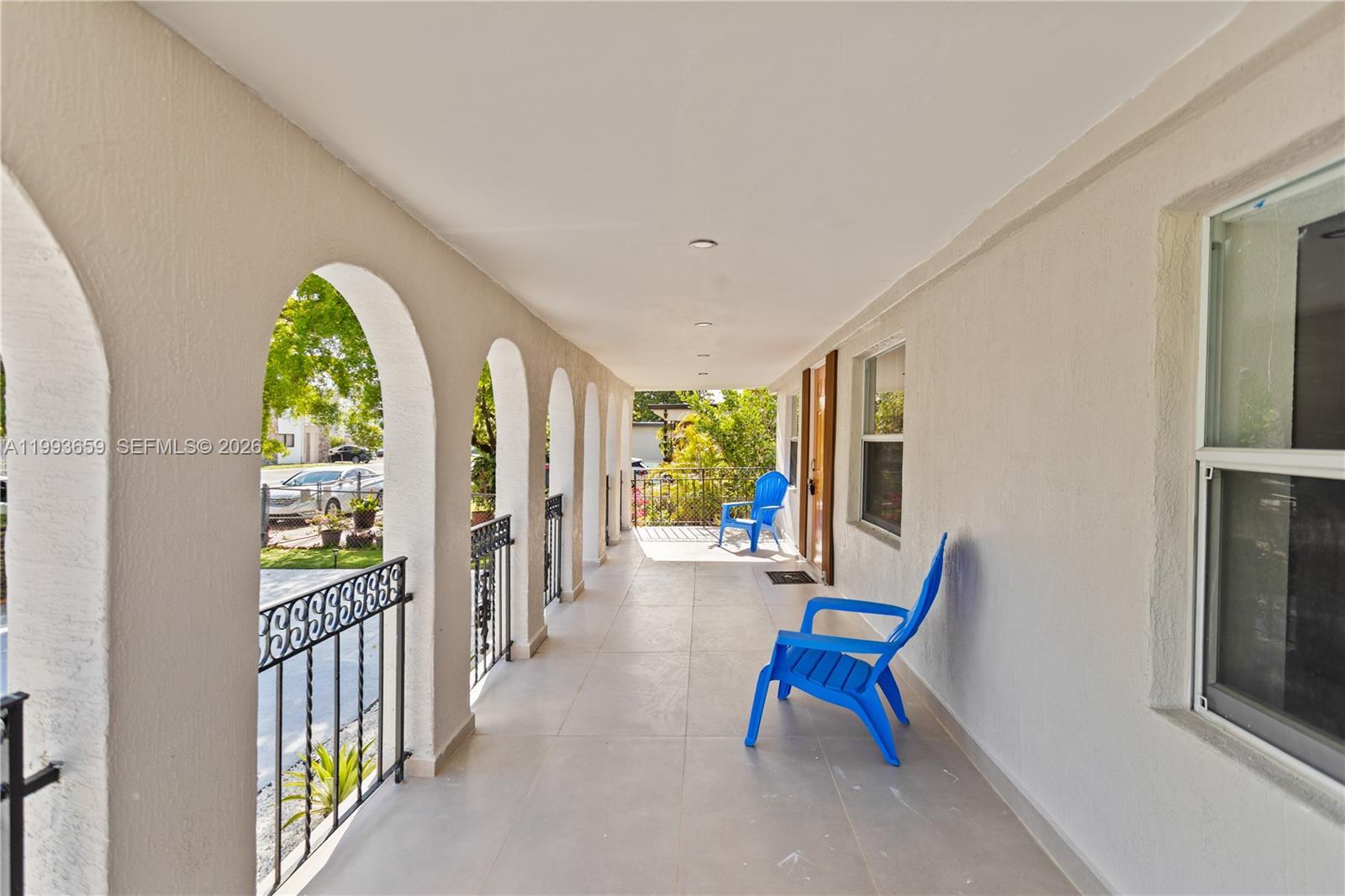 171 West 13th Street Hialeah, FL 33010 - Photo 6 of 84 a living room with furniture and a large window