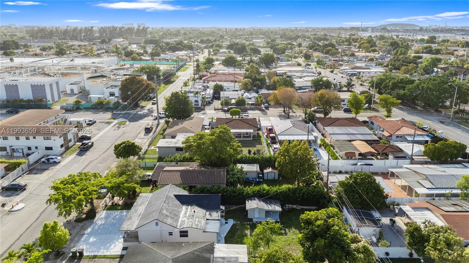 171 West 13th Street Hialeah, FL 33010 - Photo 63 of 84 an aerial view of residential houses with outdoor space
