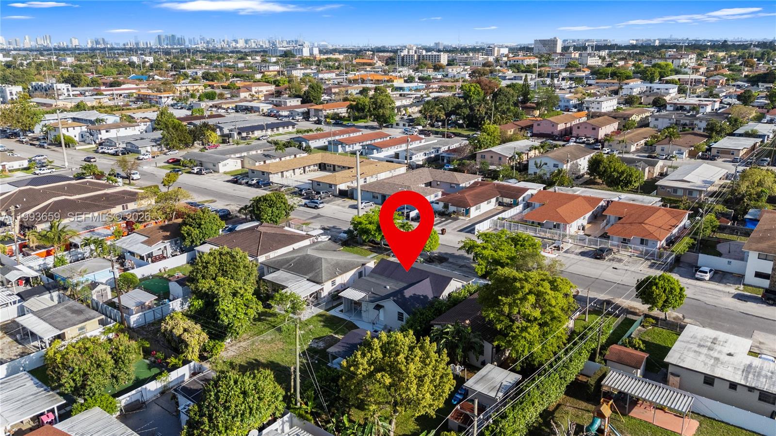 171 West 13th Street Hialeah, FL 33010 - Photo 70 of 84 an aerial view of residential houses with outdoor space
