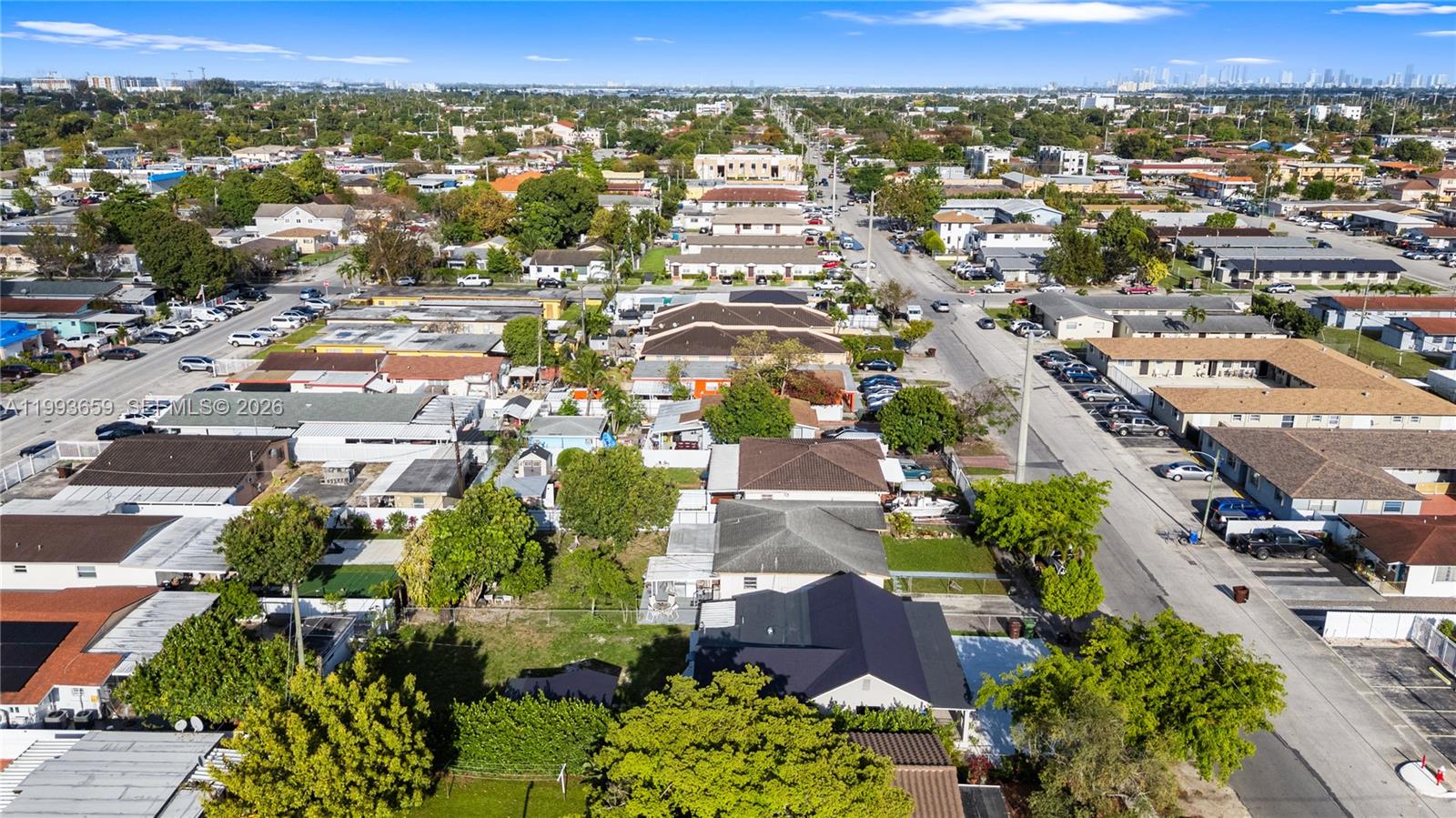 171 West 13th Street Hialeah, FL 33010 - Photo 73 of 84 an aerial view of residential houses with outdoor space