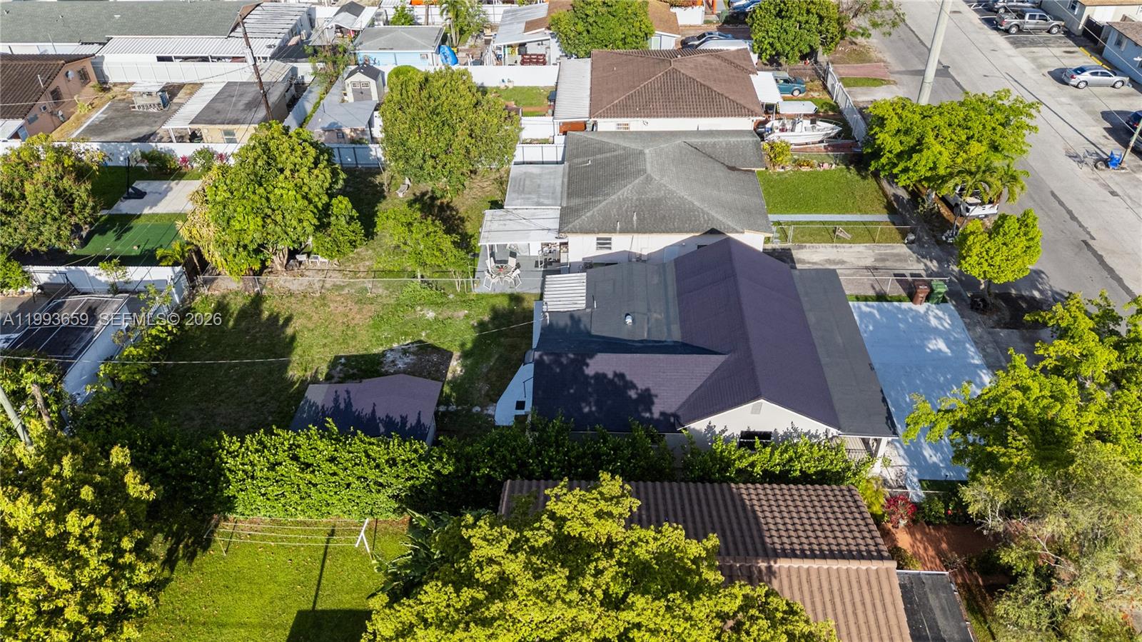 171 West 13th Street Hialeah, FL 33010 - Photo 75 of 84 an aerial view of a house with a yard