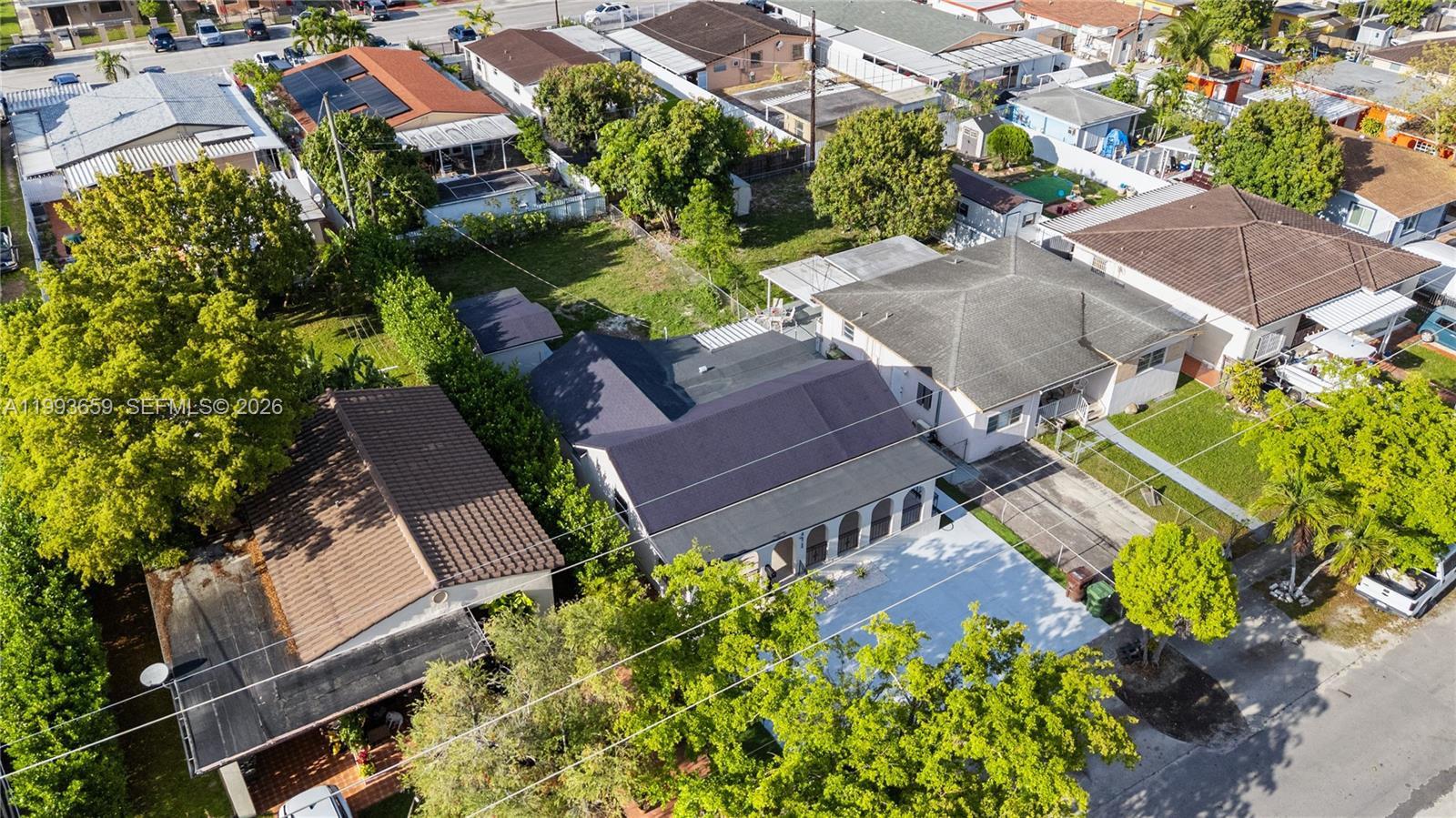 171 West 13th Street Hialeah, FL 33010 - Photo 79 of 84 an aerial view of a house with a garden