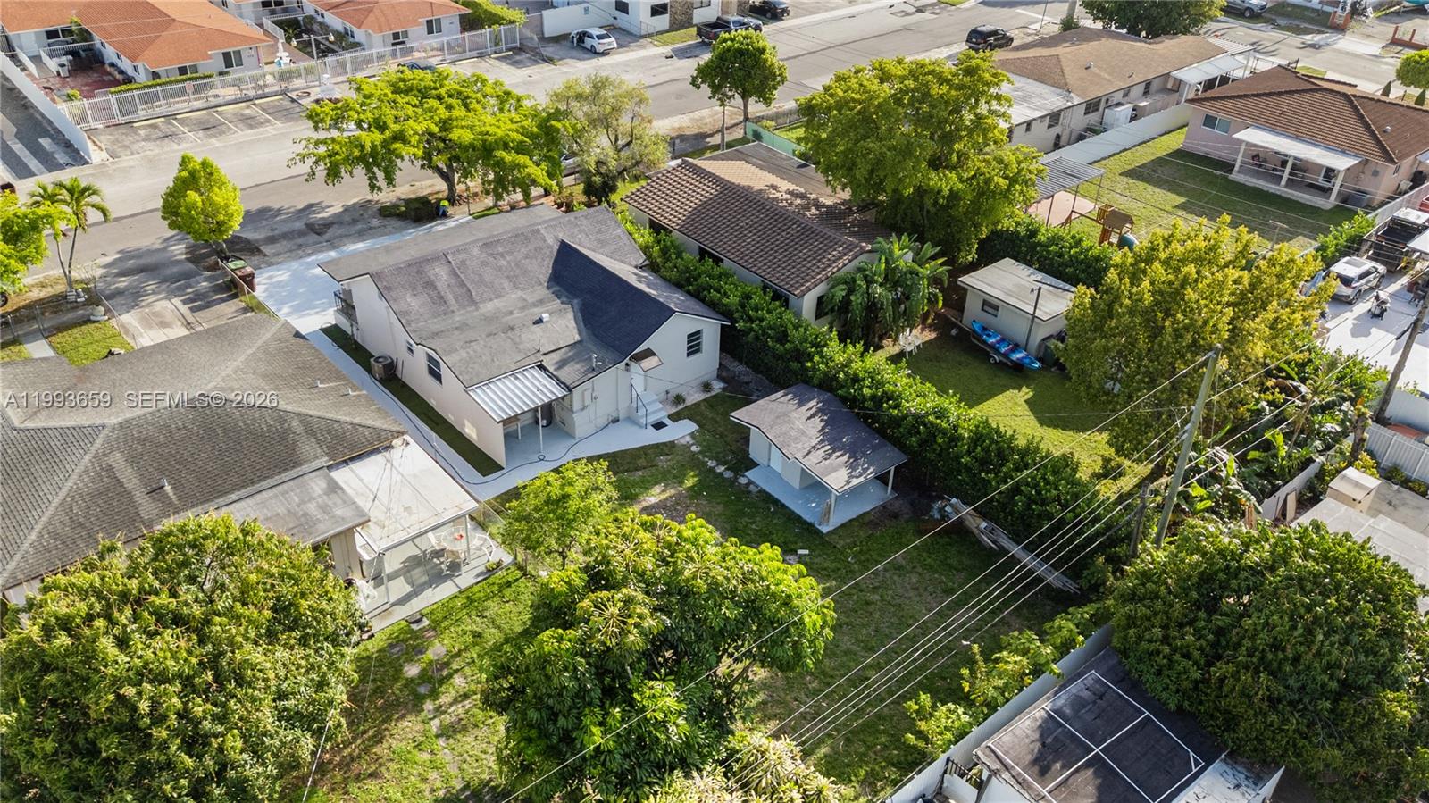 171 West 13th Street Hialeah, FL 33010 - Photo 81 of 84 an aerial view of residential houses with outdoor space