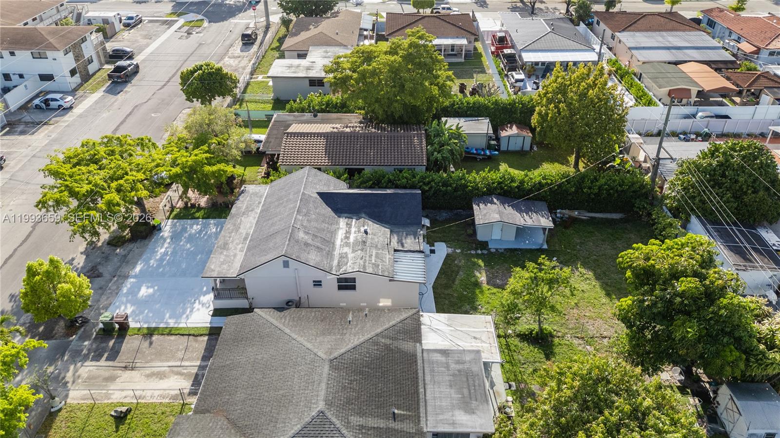 171 West 13th Street Hialeah, FL 33010 - Photo 82 of 84 an aerial view of a house with a garden