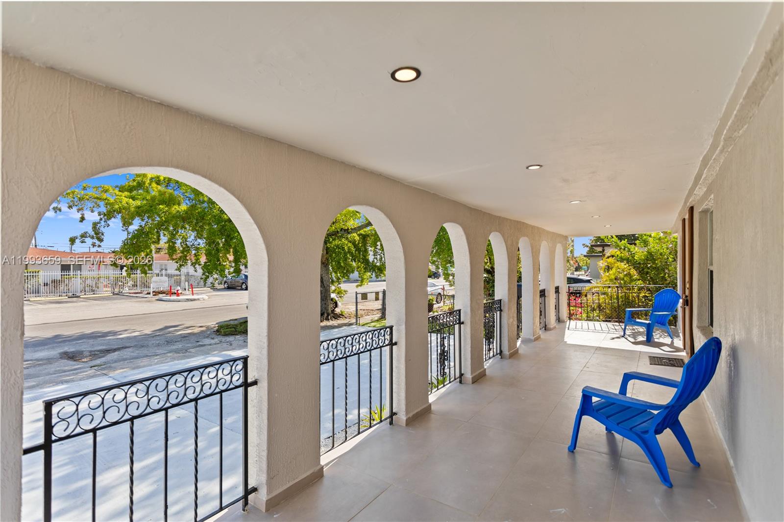 171 West 13th Street Hialeah, FL 33010 - Photo 10 of 84 a view of a porch with furniture and garden
