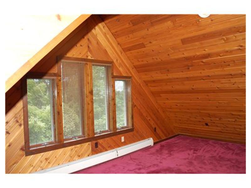 415 Ridge Road Brownsville, PA 15417 - Photo 8 of 22 Other. One od two lofts on the second floor with views of the outstanding property. Notice the gorgeous tongue in groove ceiling.