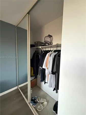 a room with furniture and wooden floor