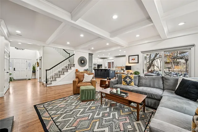 a living room with furniture and a table