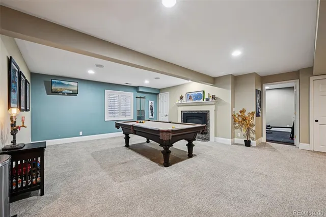 a room with furniture and a fireplace