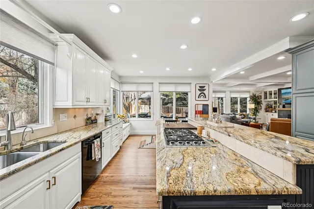 a large kitchen with granite countertop lots of counter top space