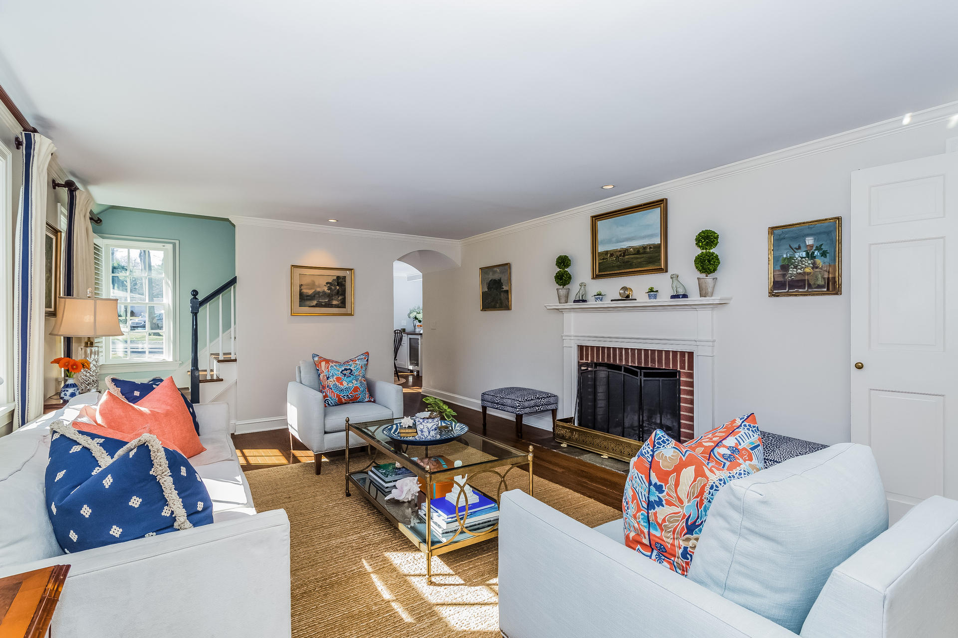 27 Sunset Road Darien, CT 06820 - Photo 11 of 41 a living room with furniture and a fireplace