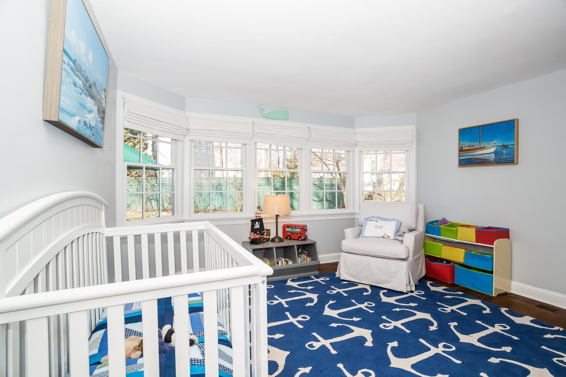 27 Sunset Road Darien, CT 06820 - Photo 19 of 41 a bedroom with furniture and a window