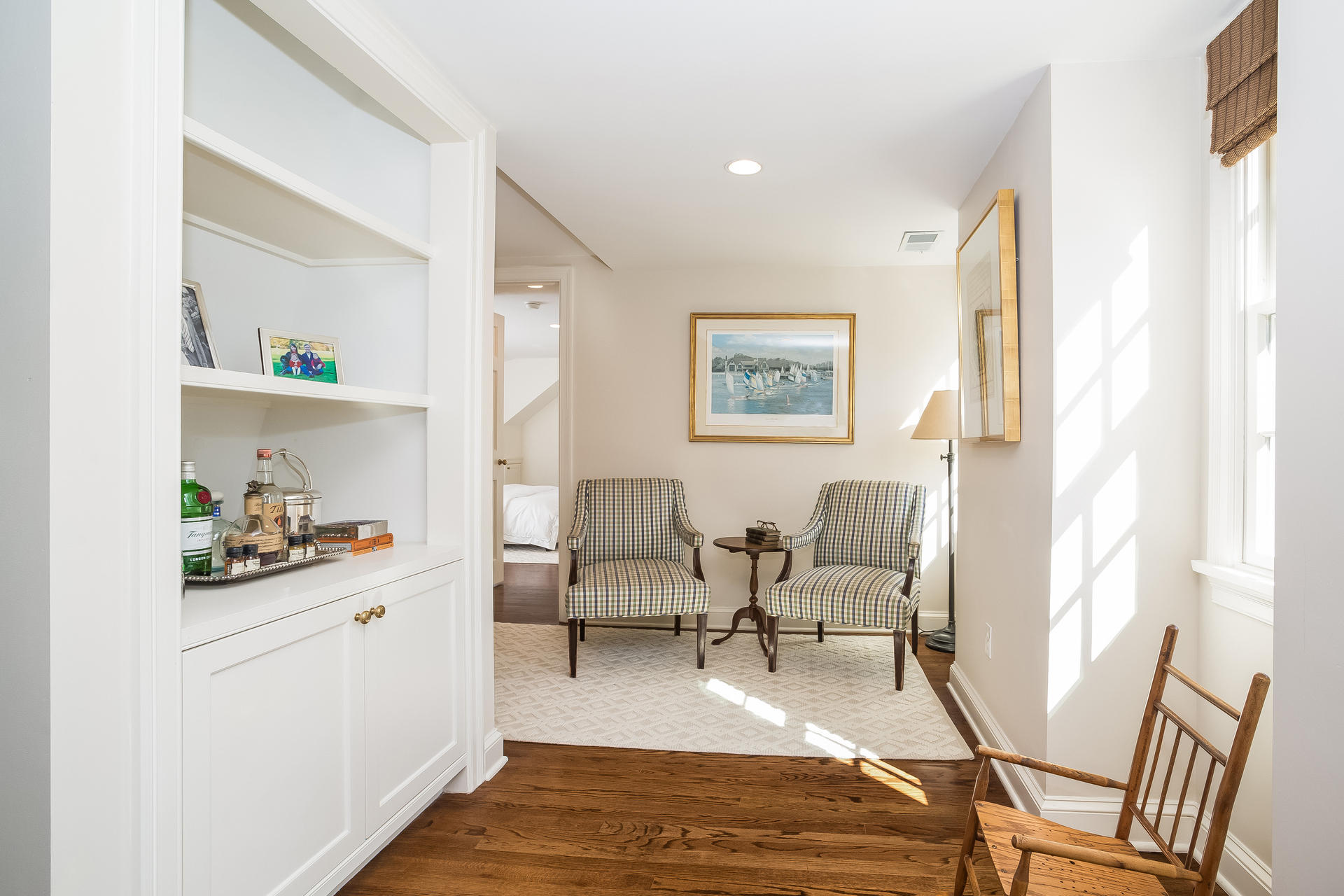 27 Sunset Road Darien, CT 06820 - Photo 22 of 41 a living room with furniture and a wooden floor