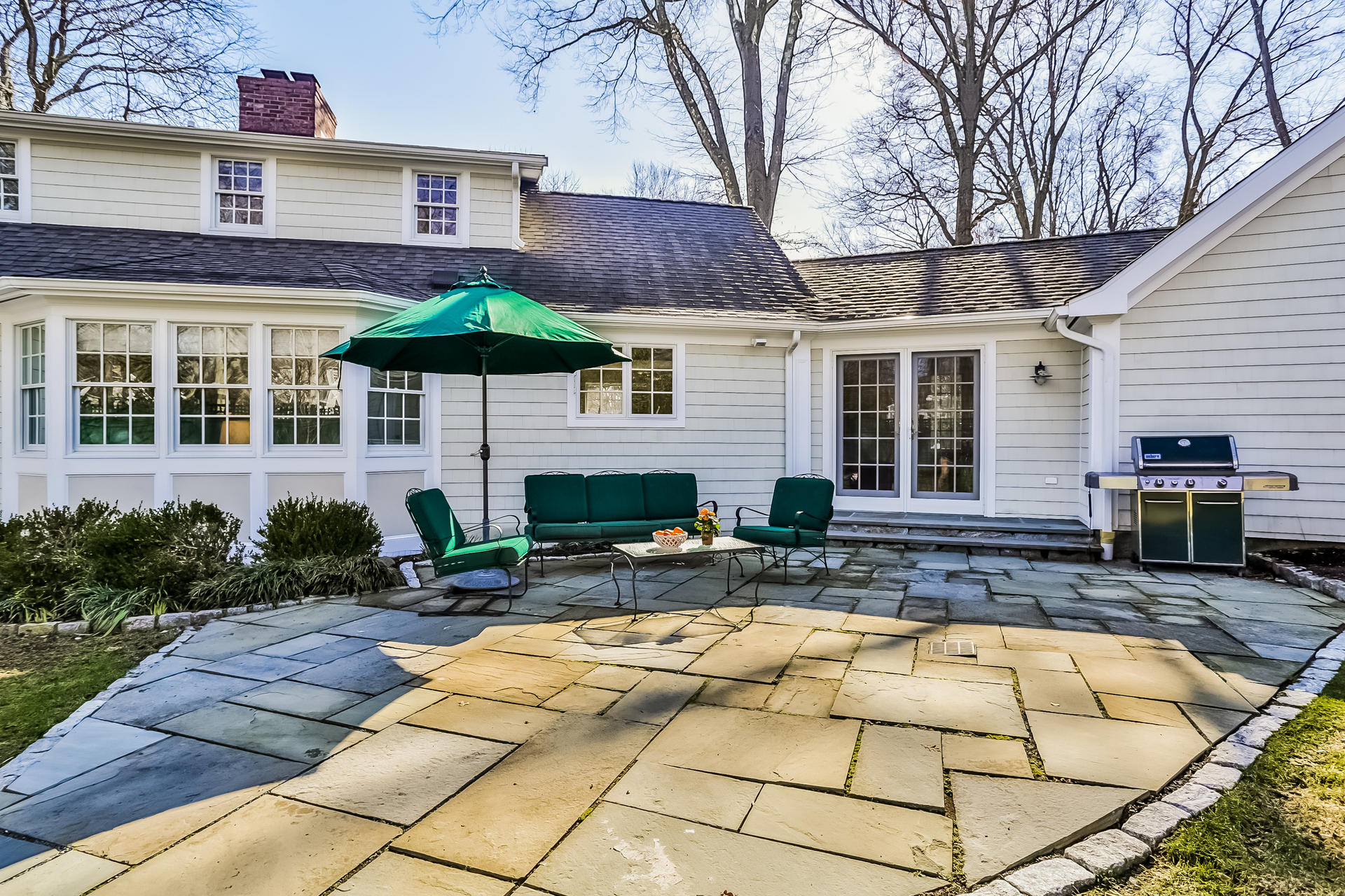27 Sunset Road Darien, CT 06820 - Photo 31 of 41 a view of house with swimming pool outdoor seating and barbeque oven
