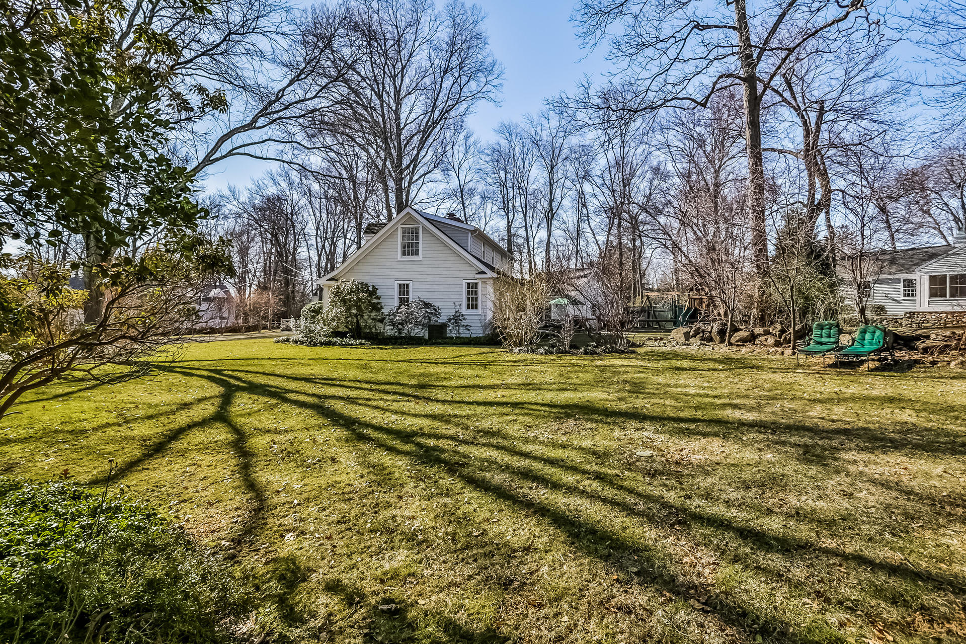 27 Sunset Road Darien, CT 06820 - Photo 36 of 41 a view of yard with swimming pool and green space
