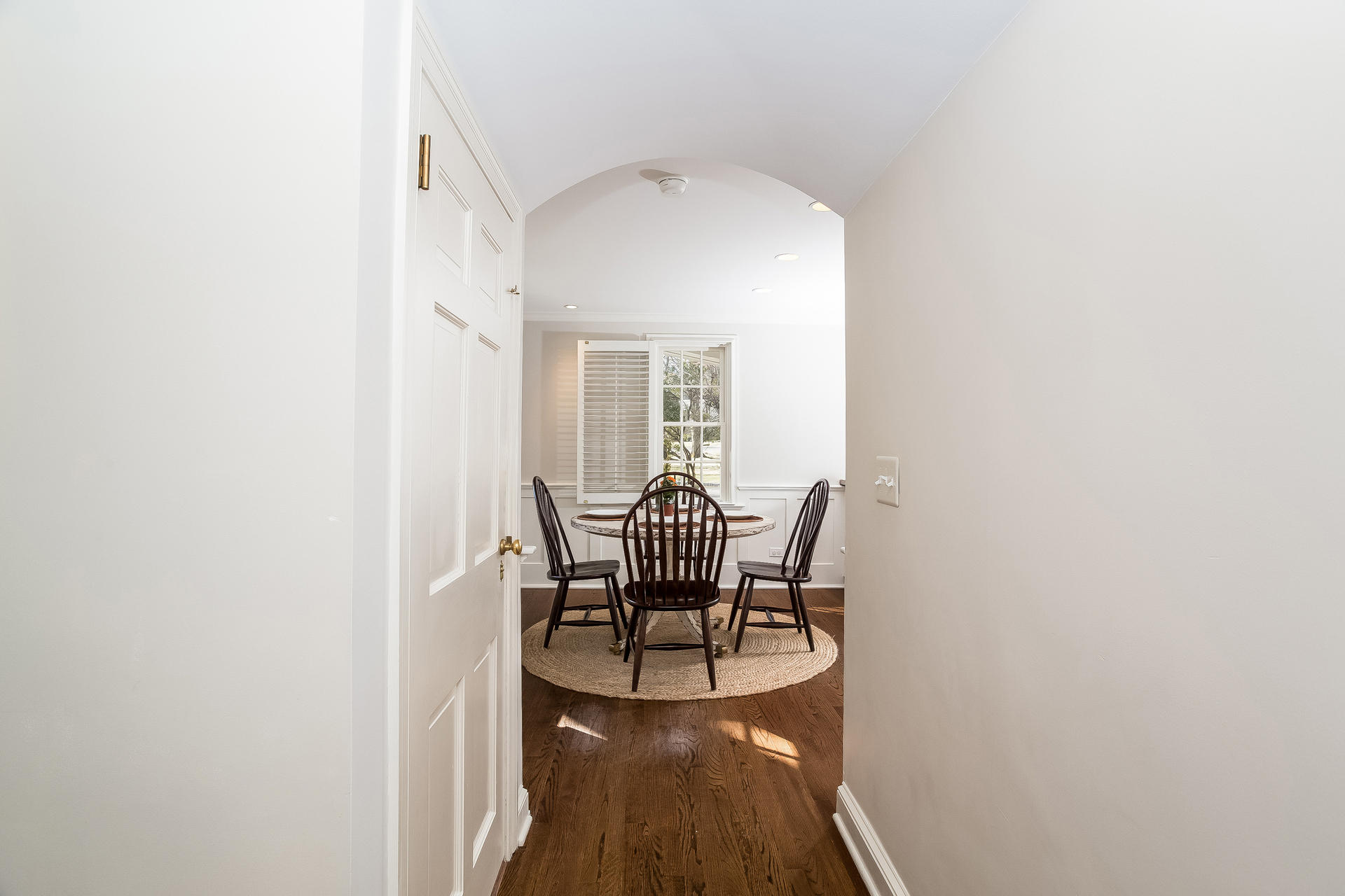 27 Sunset Road Darien, CT 06820 - Photo 8 of 41 a dining room with furniture and wooden floor