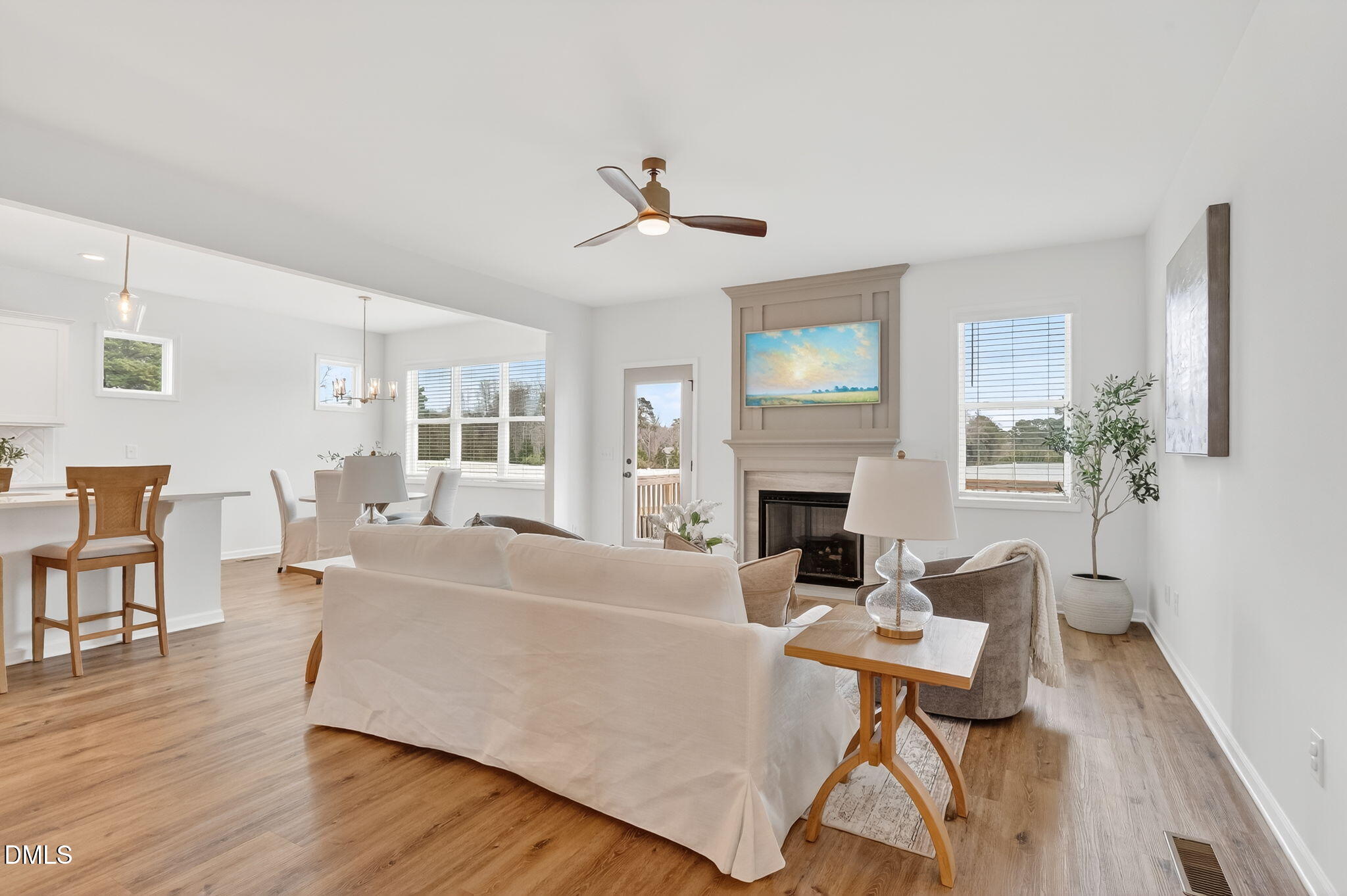 18 North Bream Court Angier, NC 27501 - Photo 12 of 49 a living room with furniture fireplace and window