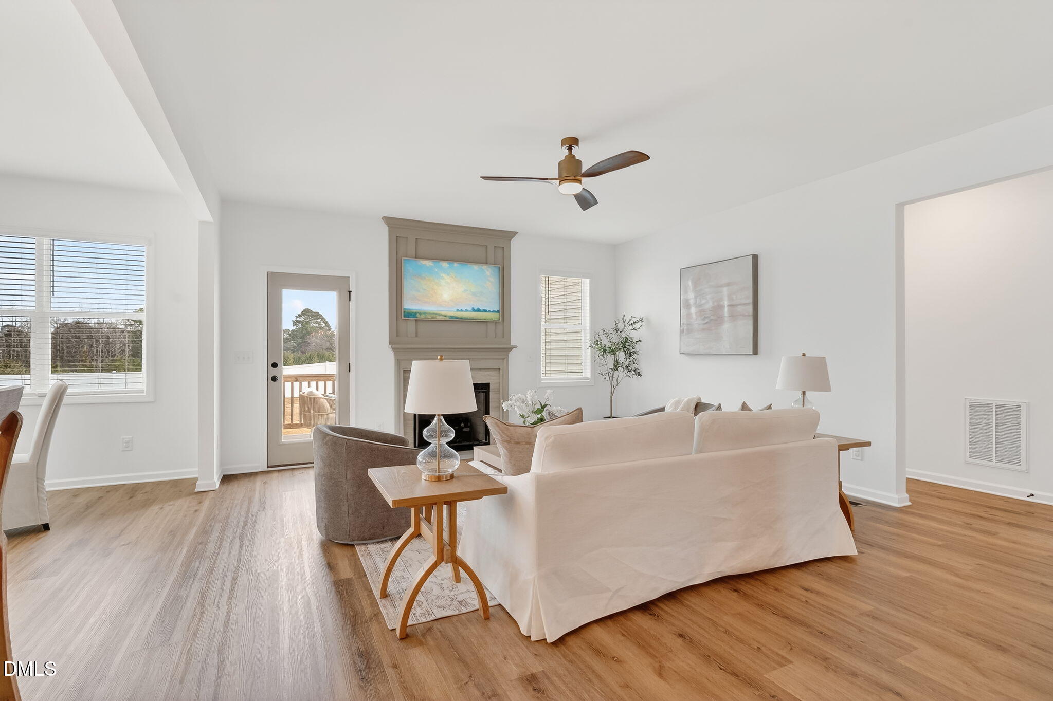 18 North Bream Court Angier, NC 27501 - Photo 14 of 49 a living room with furniture and a wooden floor