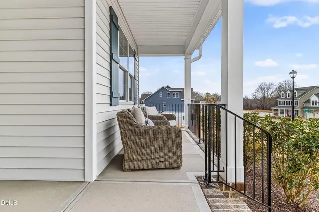 a view of balcony with furniture