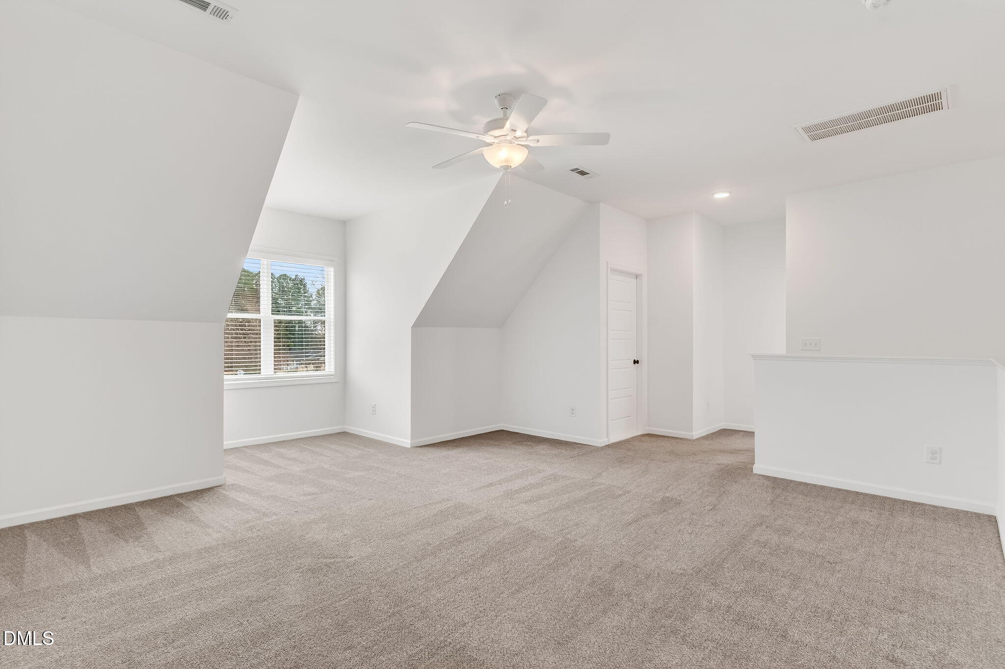 18 North Bream Court Angier, NC 27501 - Photo 30 of 49 an empty room with windows and fan