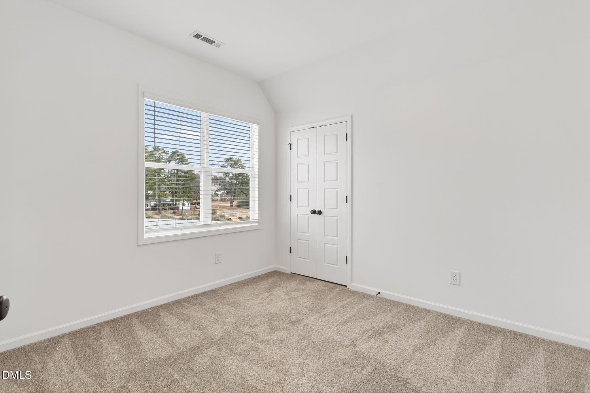 18 North Bream Court Angier, NC 27501 - Photo 31 of 49 a view of an empty room with a window