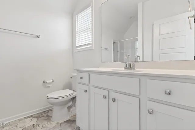 a view of a chairs on wooden deck