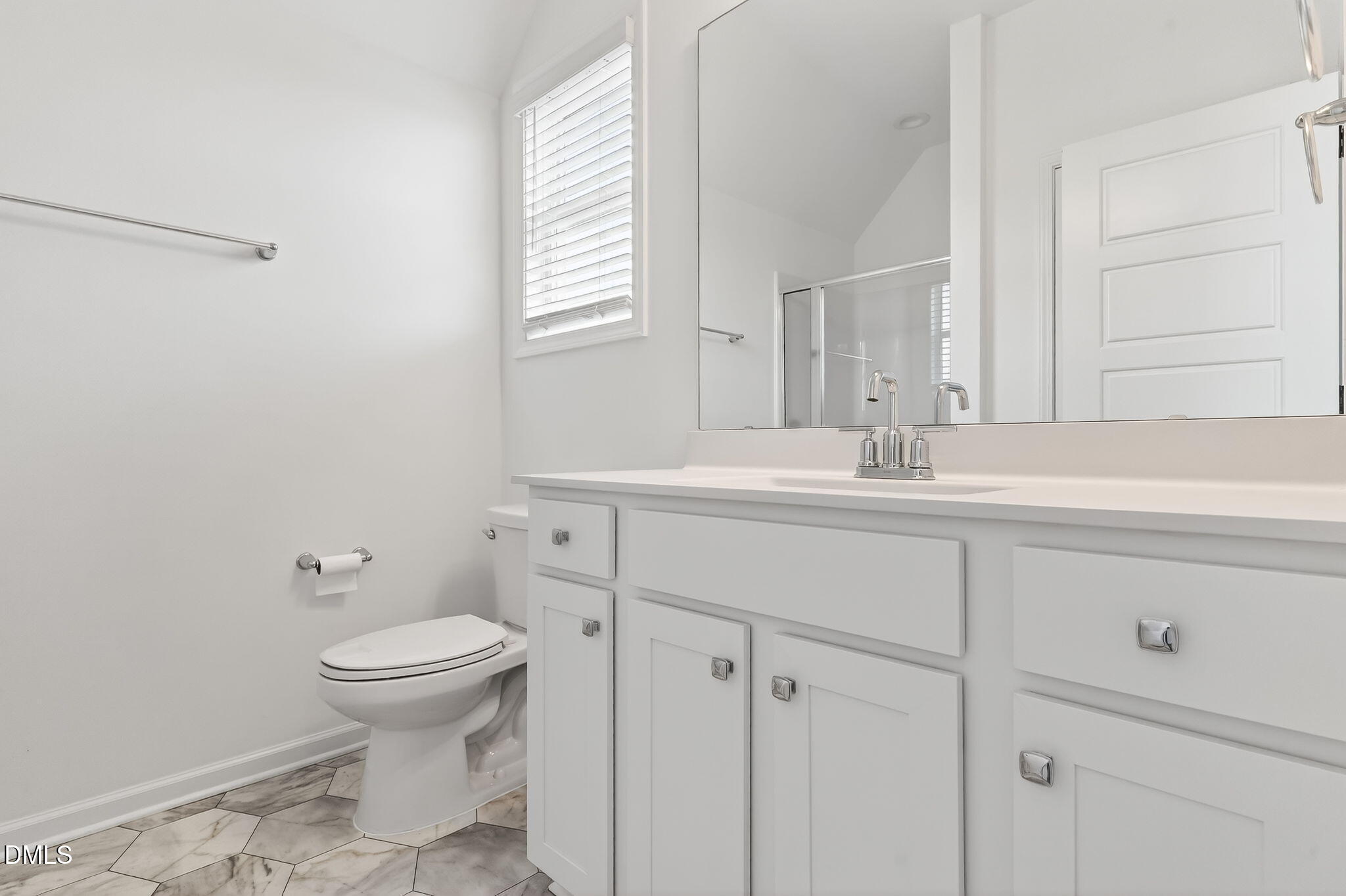 18 North Bream Court Angier, NC 27501 - Photo 42 of 49 a bathroom with a sink toilet and vanity