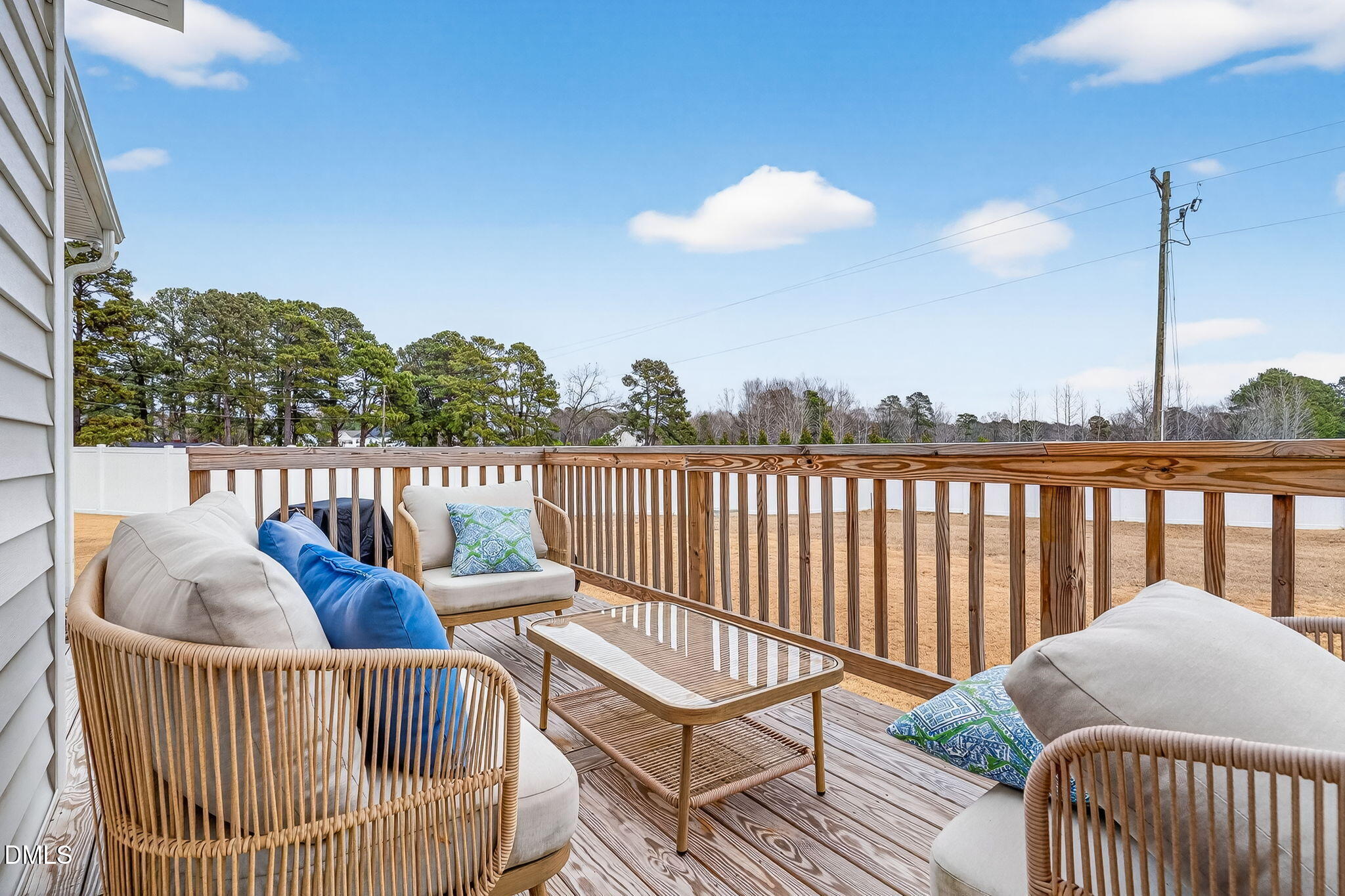 18 North Bream Court Angier, NC 27501 - Photo 45 of 49 a roof deck with couches and wooden floor
