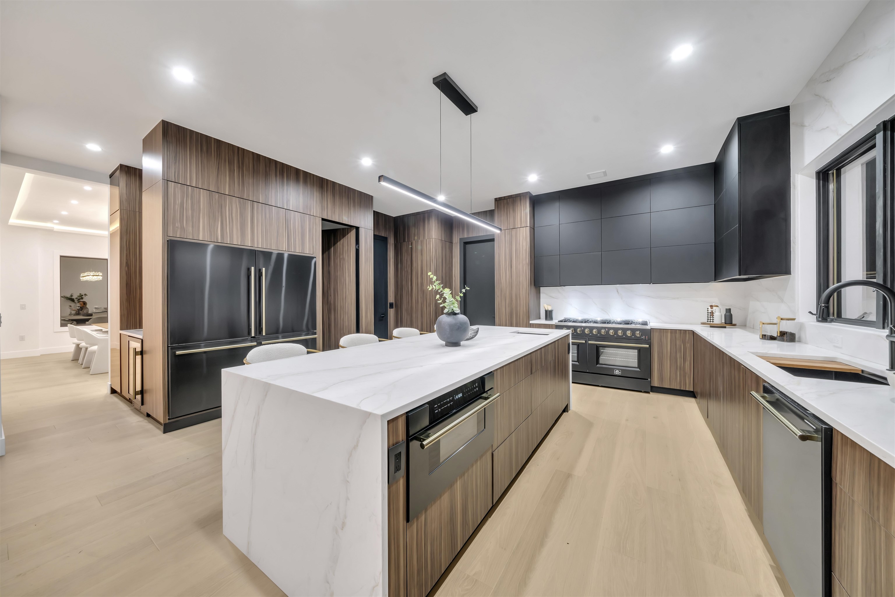 801 Godwin Road Paramus, NJ 07652 - Photo 24 of 50 a large kitchen with a large counter top sink stainless steel appliances and cabinets
