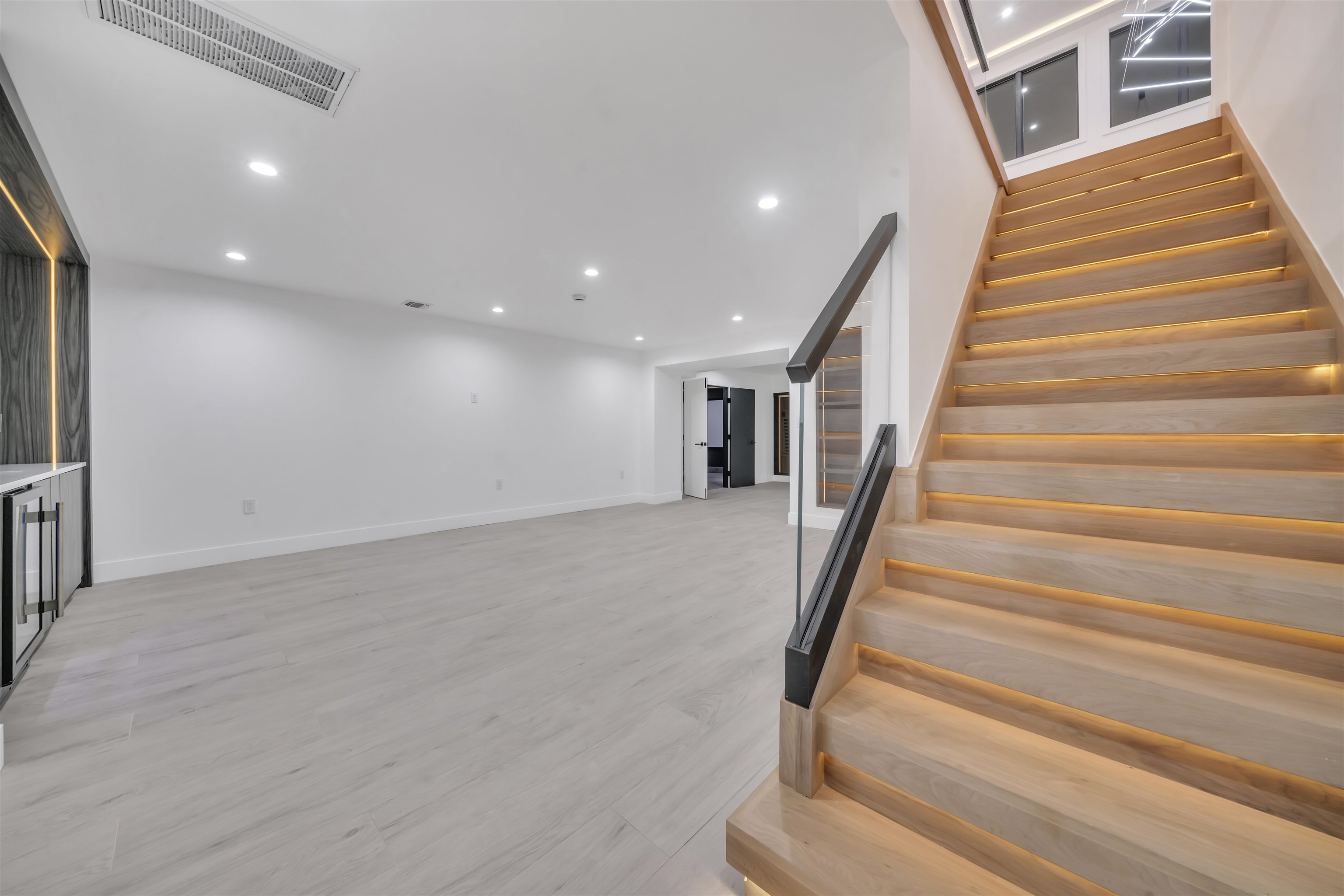 801 Godwin Road Paramus, NJ 07652 - Photo 40 of 50 a view of entryway and hall with wooden floor