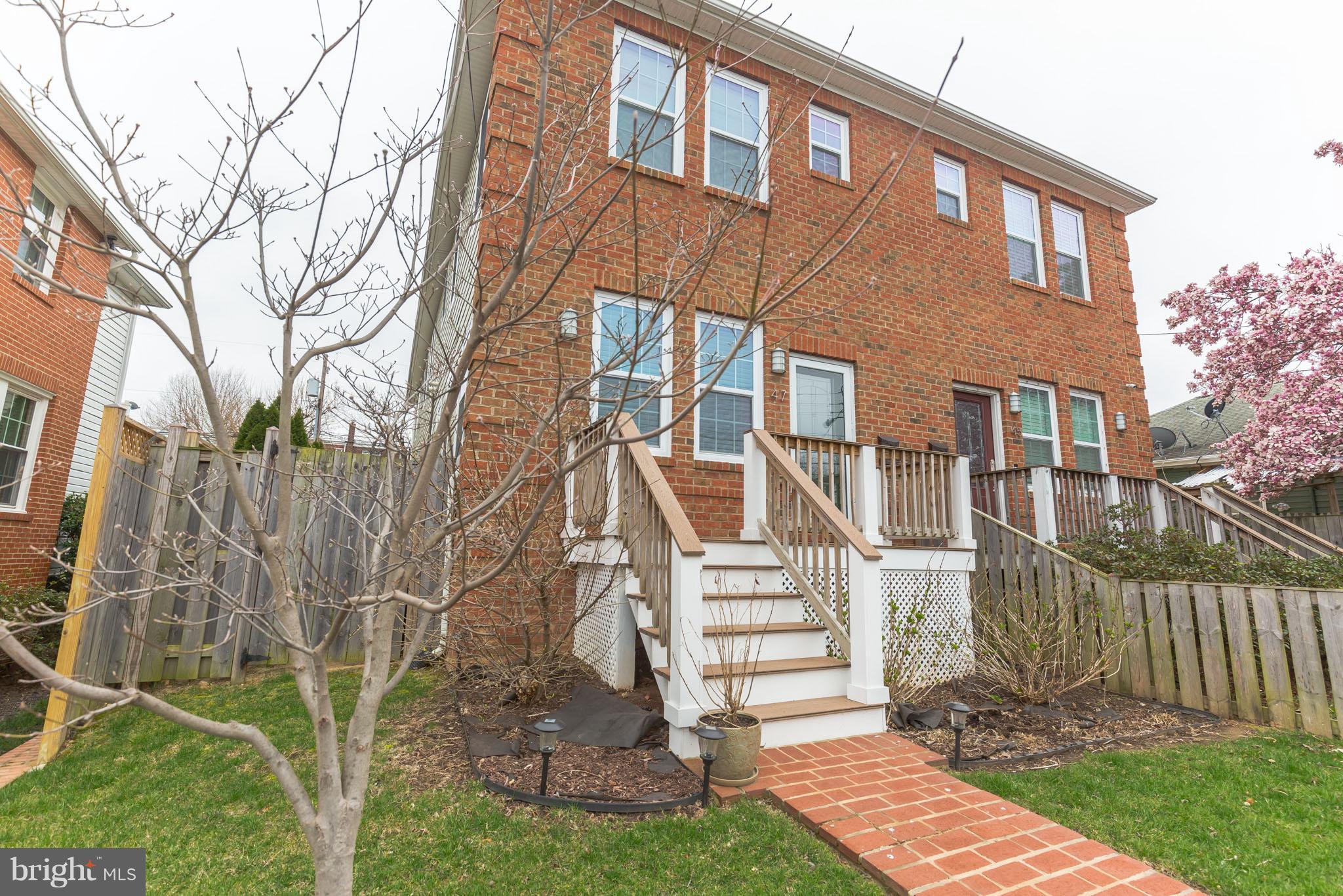 41 East Reed Avenue Alexandria, VA 22305 - Photo 2 of 30 a front view of a house with a yard