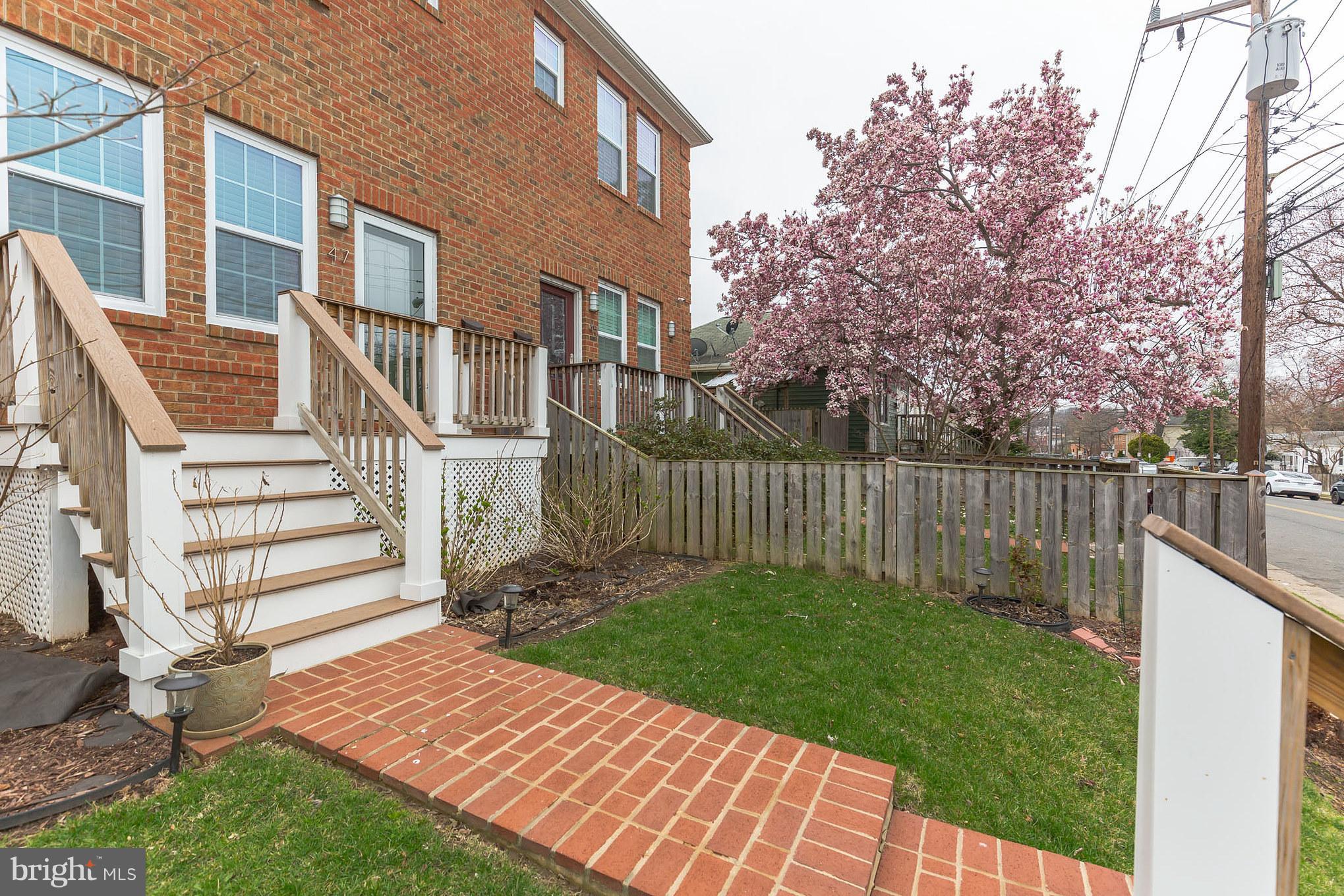 41 East Reed Avenue Alexandria, VA 22305 - Photo 3 of 30 a view of a house with a yard