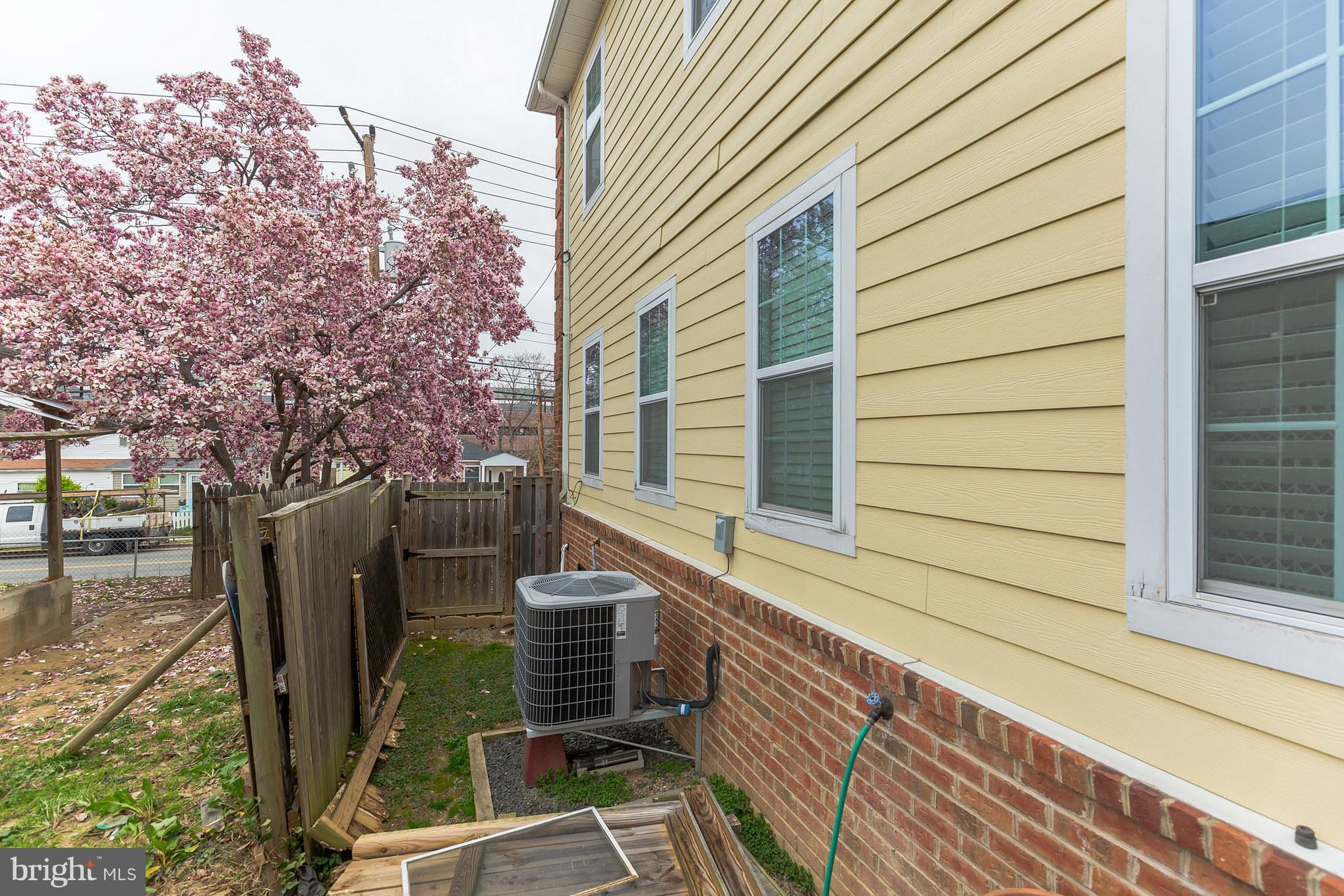41 East Reed Avenue Alexandria, VA 22305 - Photo 26 of 30 a front view of a house with trees